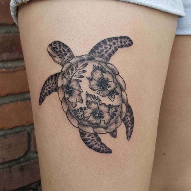 sea turtle with flowers tattoo design