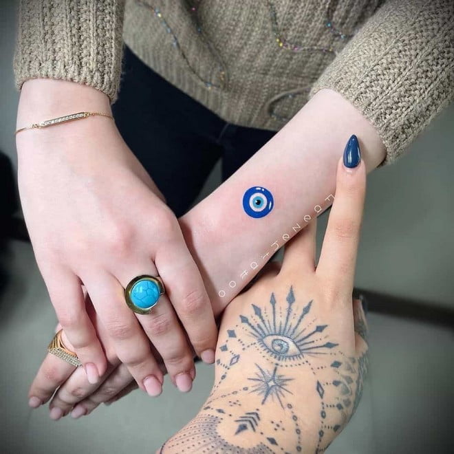 blue evil eye tattoo design