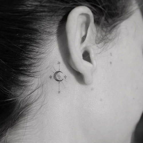 behind the ear crescent moon tattoo