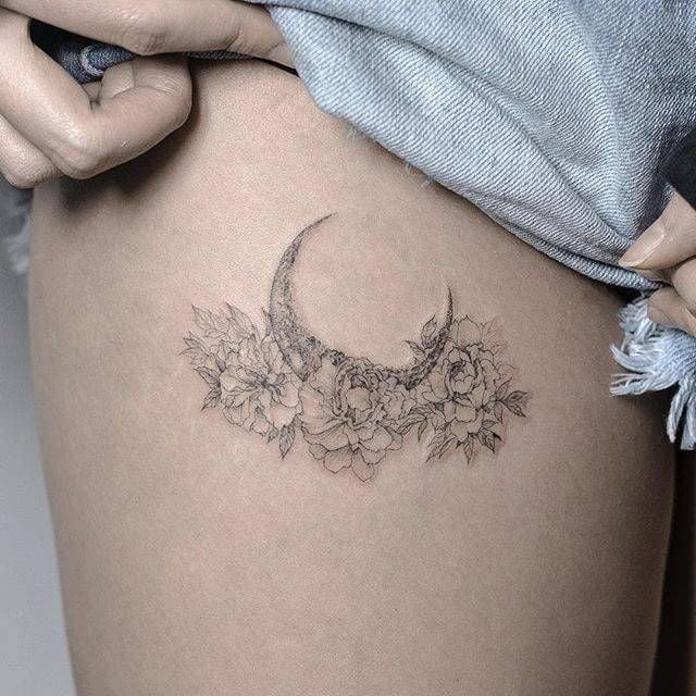 crescent moon thigh tattoo design
