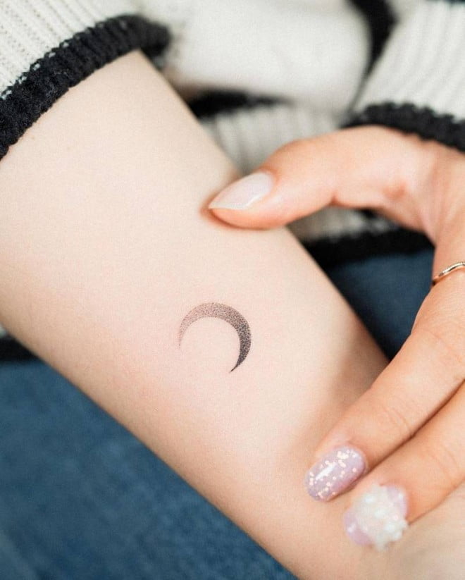 small crescent moon tattoo design