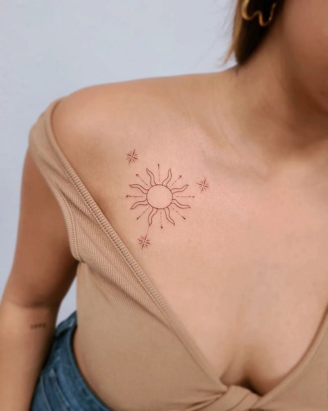 sun tattoo with three stars